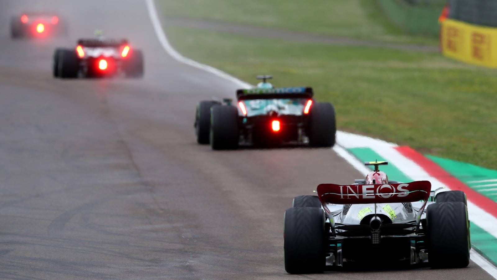 Lewis Hamilton's Mercedes behind three other cars. Imola April 2022.