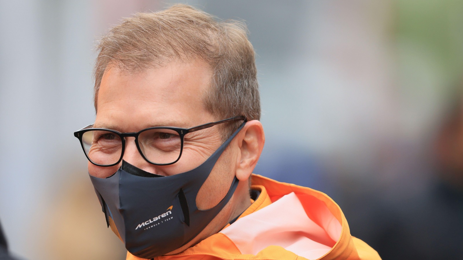 Andreas Seidl smiles whilst wearing a mask. Imola, April 2022.