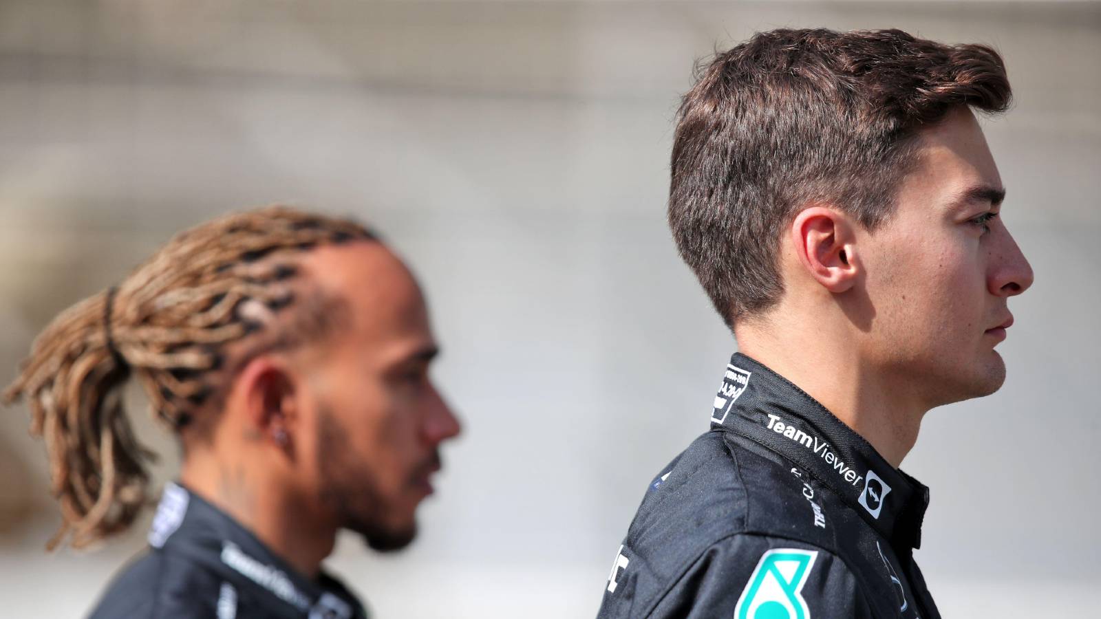 George Russell in focus with Lewis Hamilton in the background. Bahrain March 2022.