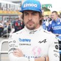 Fernando Alonso stands arms folded at Imola. Italy, April 2022.