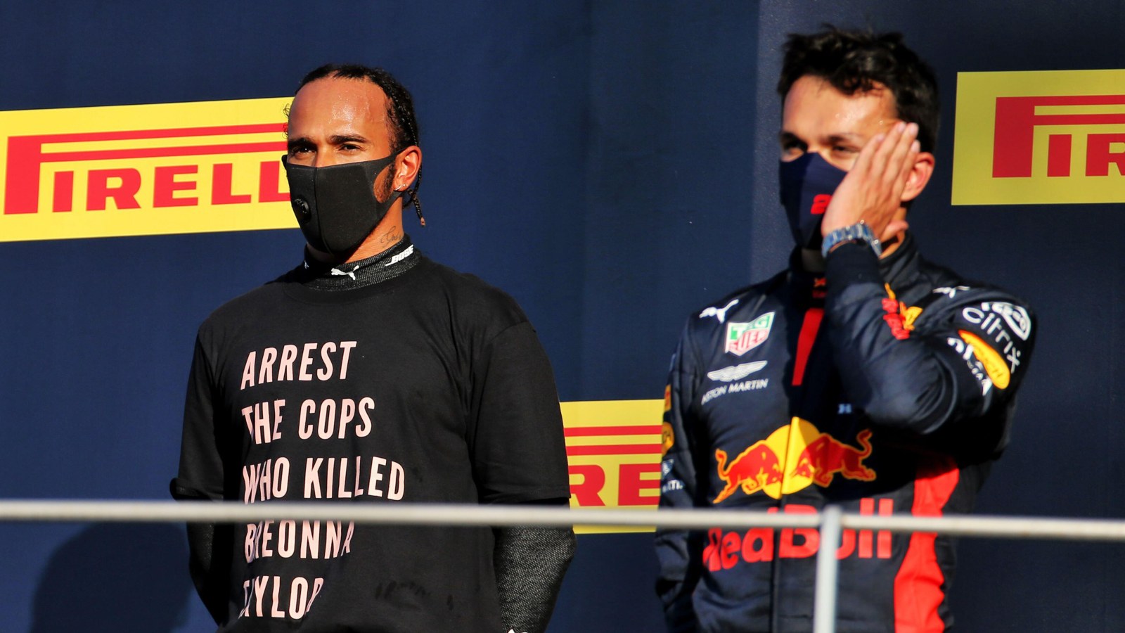 Lewis Hamilton and Alex Albon stood on the podium. Italy, September 2020.