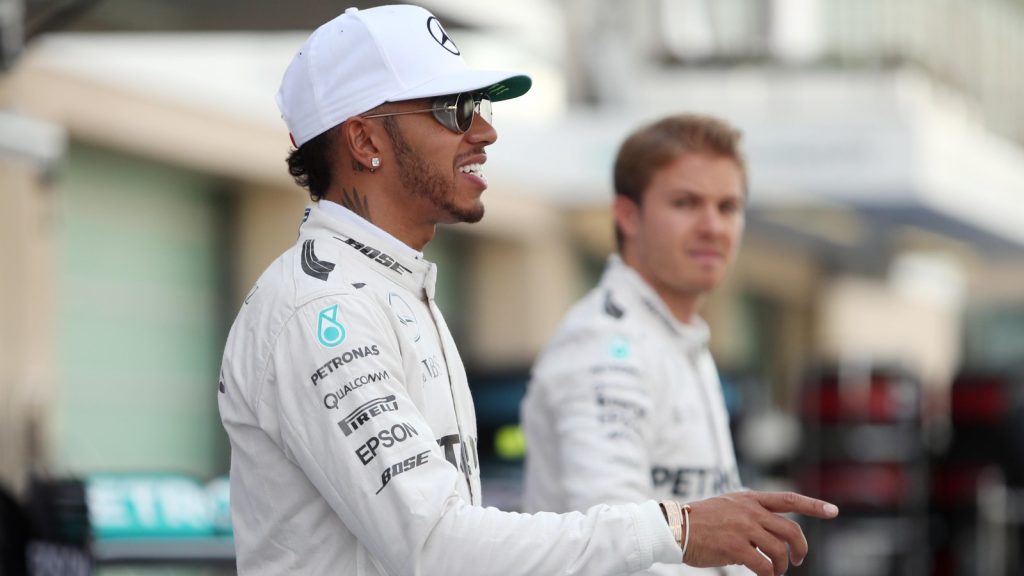 Nico Rosberg looks at then Mercedes team-mate Lewis Hamilton. Abu Dhabi, November 2016.