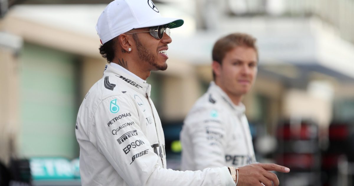 Nico Rosberg looks at then Mercedes team-mate Lewis Hamilton. Abu Dhabi, November 2016.