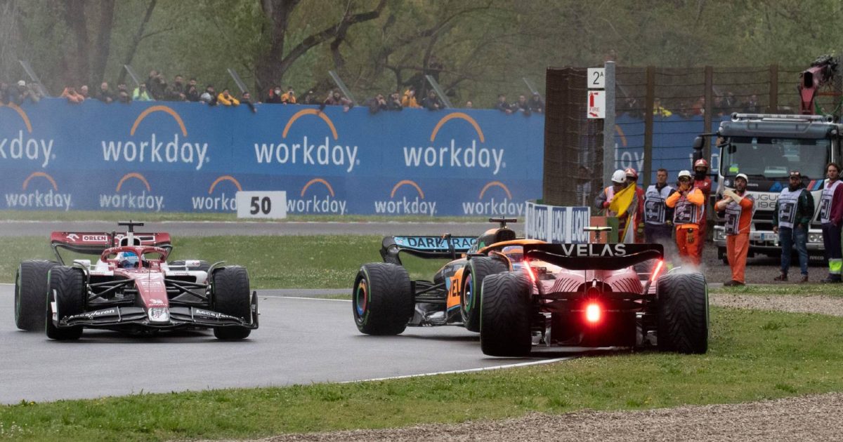 Daniel Ricciardo and Carlos Sainz collide during the Emilia Romagna GP. Imola April 2022.