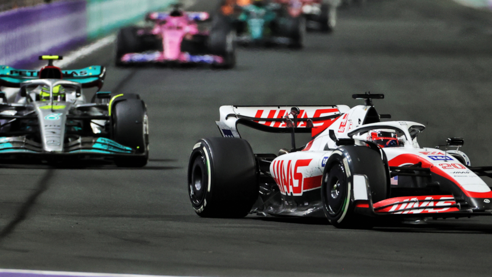 Kevin Magnussen leading Lewis Hamilton. Saudi Arabia March 2022
