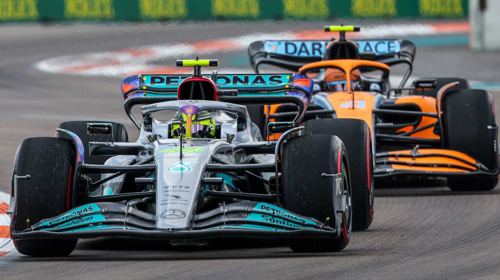Lewis Hamilton leads Lando Norris on a lap. Miami May 2022
