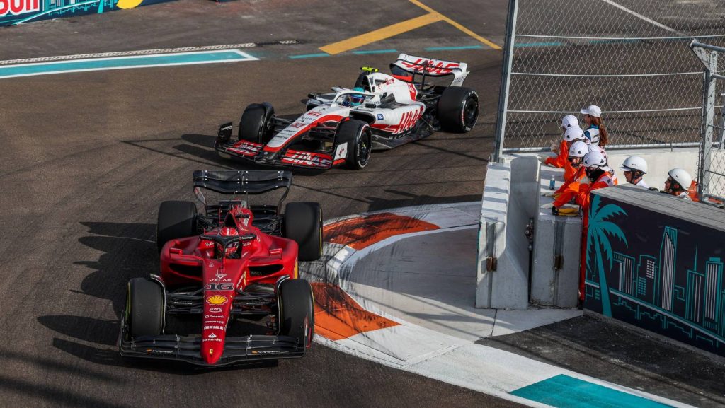 Charles Leclerc's Ferrari ahead of Mick Schumacher's Haas. Miami May 2022. 
