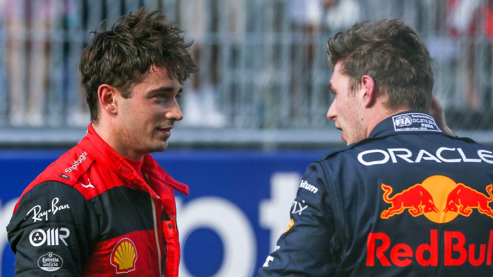 Charles Leclerc and Max Verstappen talking to each other. Miami, May 2022.