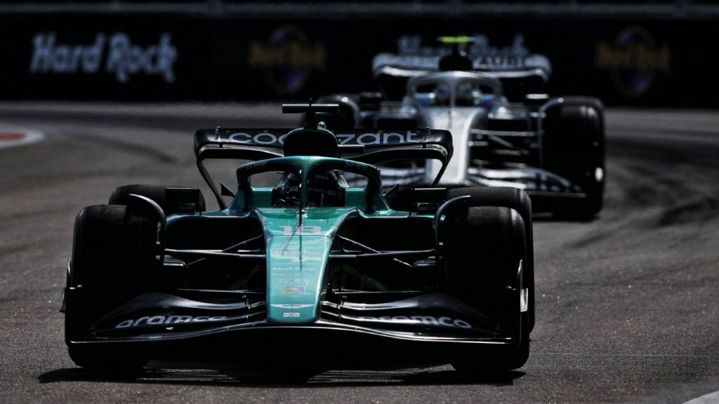 Aston Martin ahead of an AlphaTauri. Miami May 2022.