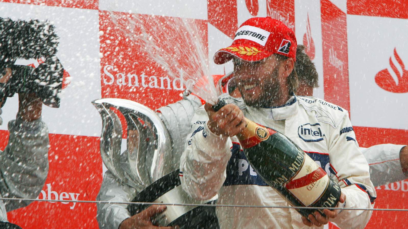 Nick Heidfeld celebrates on the podium at Silverstone, 2008.