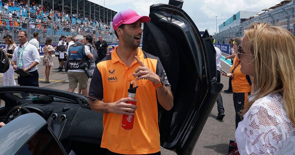 Daniel Ricciardo holding a drinks bottle. Miami May 2022.