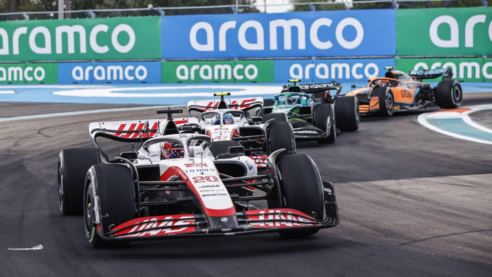 Kevin Magnussen heads a train of cars. Miami May 2022.