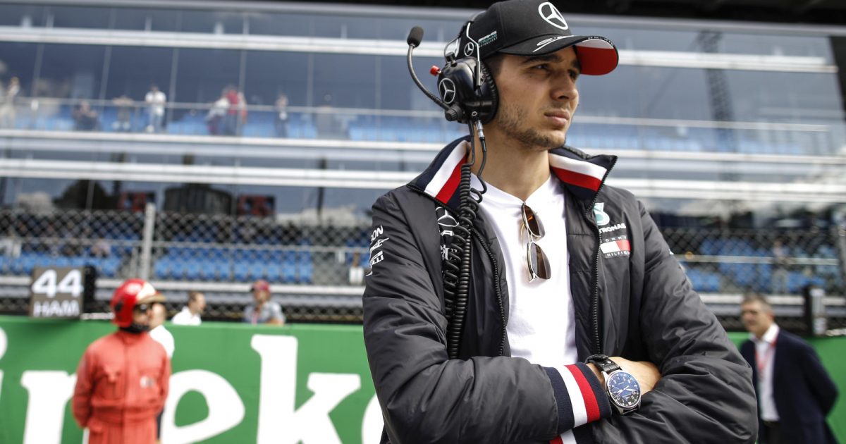 Esteban Ocon watches on while standing on the grid as Mercedes reserve driver at the 2019 Italian Grand Prix. Monza, September 2019
