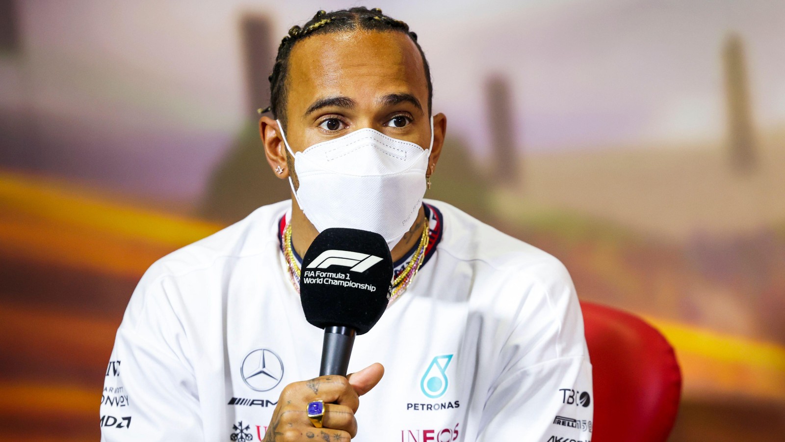Lewis Hamilton speaking into a microphone. Barcelona, May 2022.