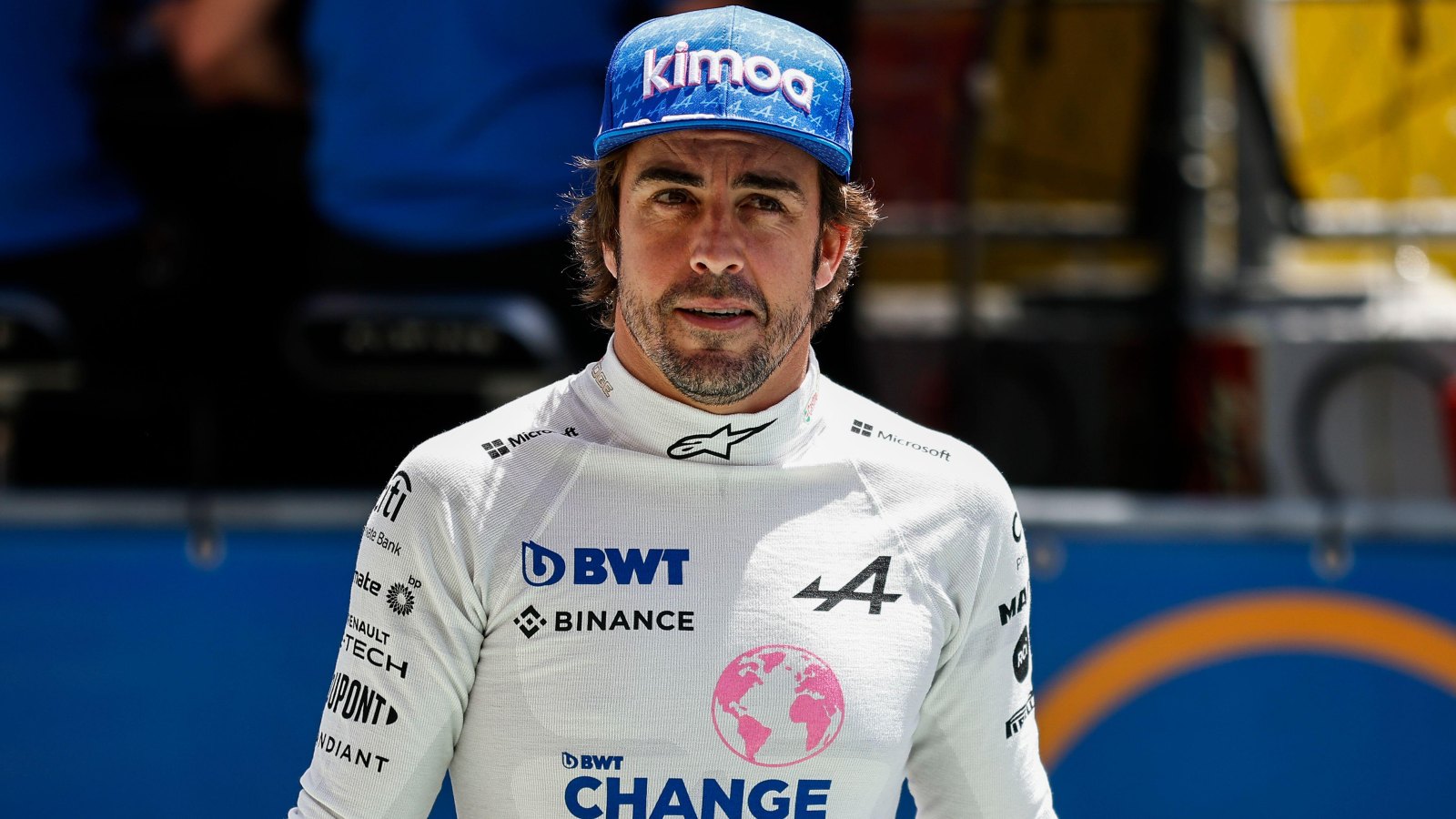 Fernando Alonso looks up whilst walking down the track. Barcelona, May 2022.