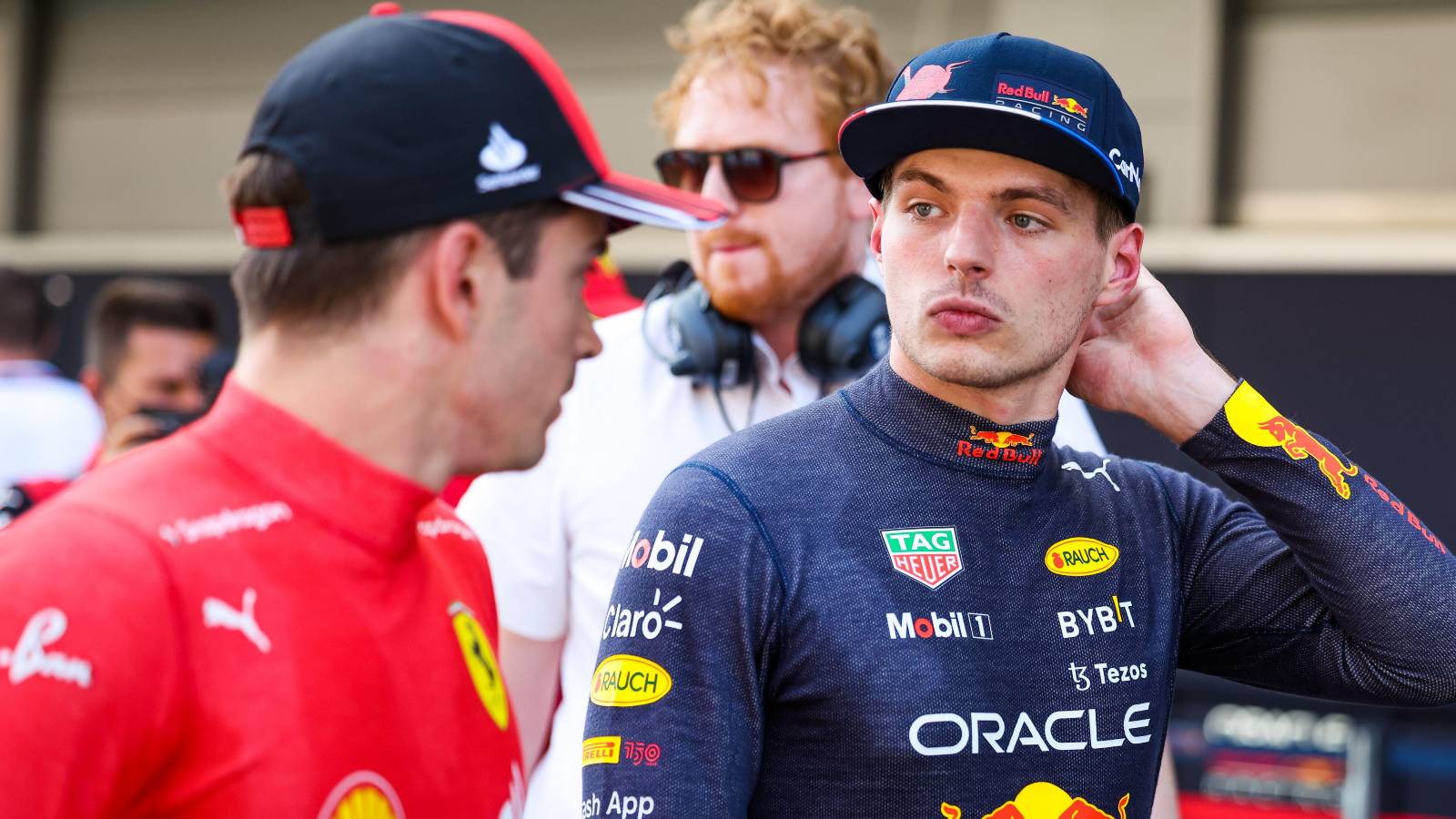 Max Verstappen, Red Bull, looks at Charles Leclerc, Ferrari. Spain, May 2022.