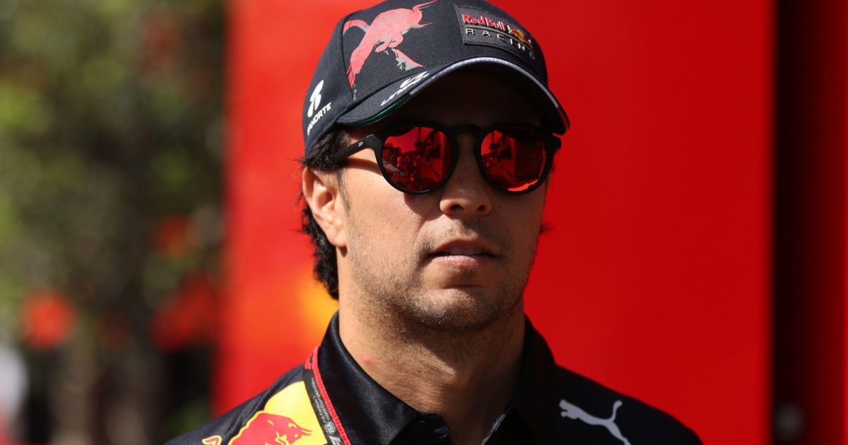 Sergio Perez, Red Bull, wears sunglasses. Spain, May 2022.