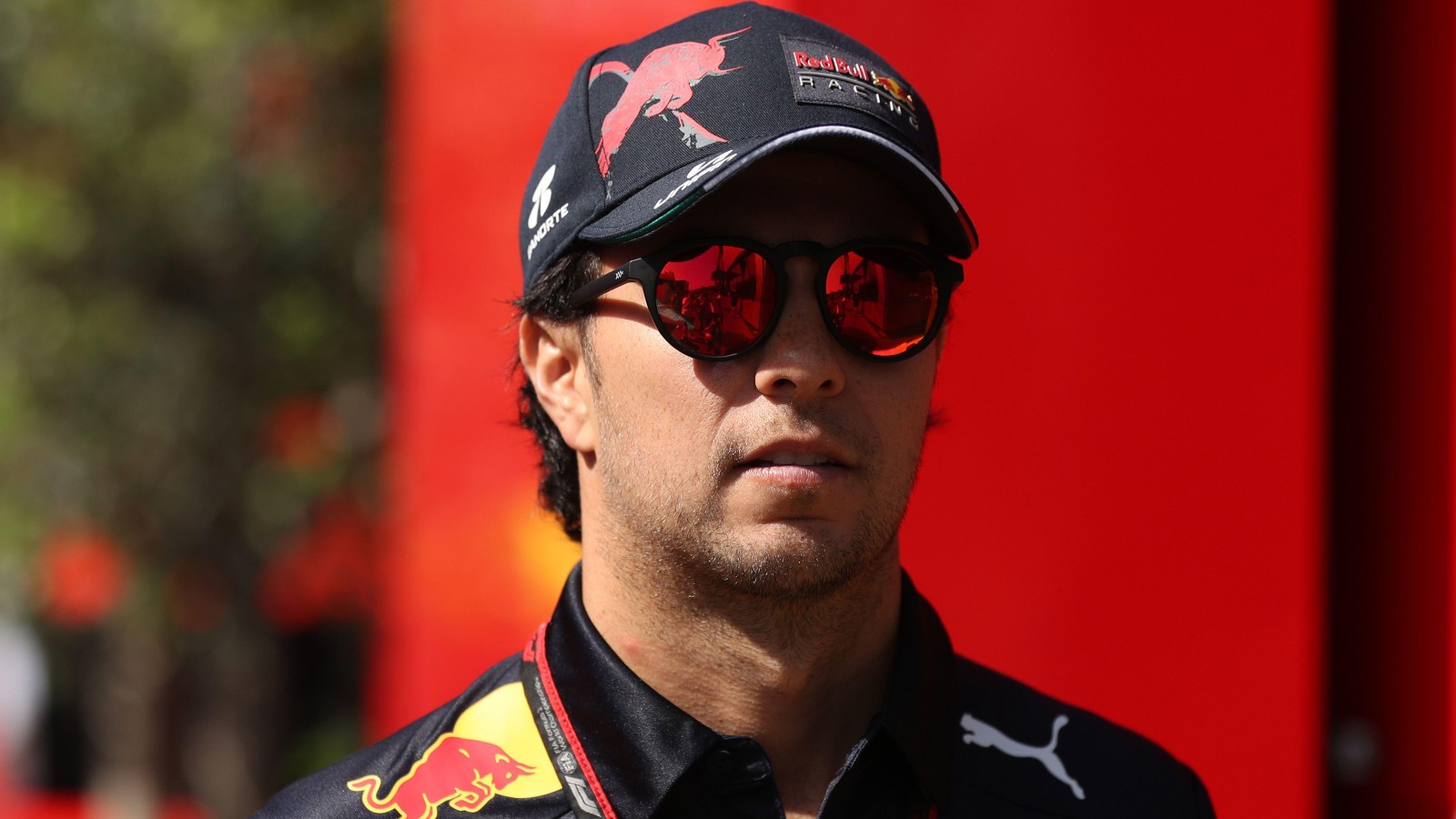 Sergio Perez, Red Bull, wears sunglasses. Spain, May 2022.