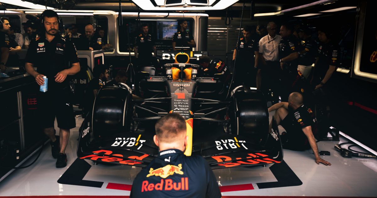 Max Verstappen's RB18 in the garage with relaxed mechanics. Spain May 2022