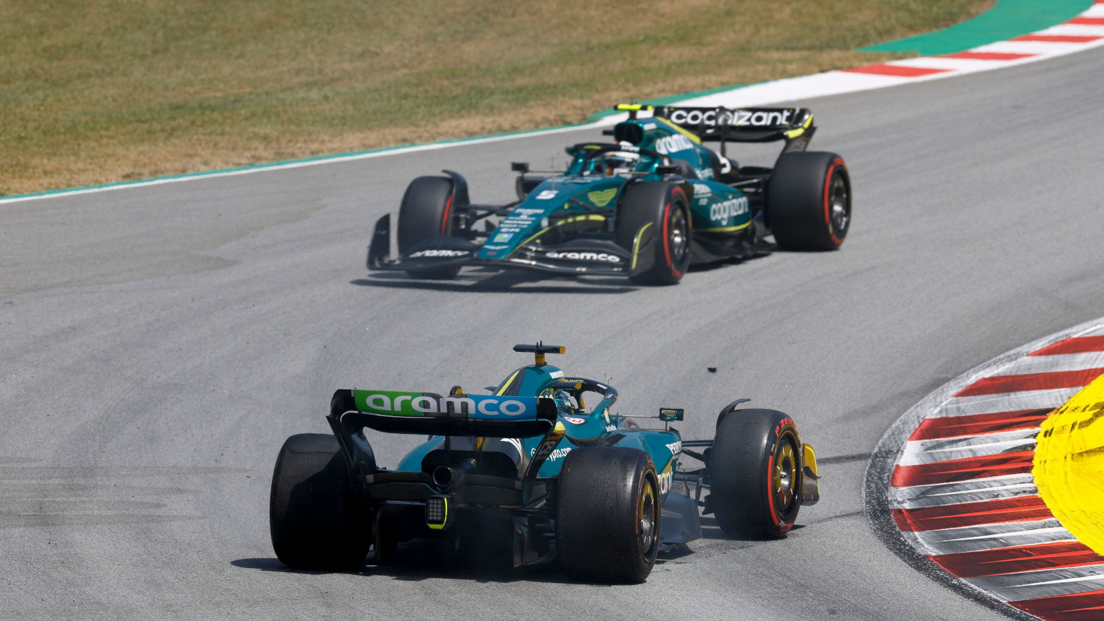 Sebastian Vettel passes the spinning Lance Stroll. Spain May 2022