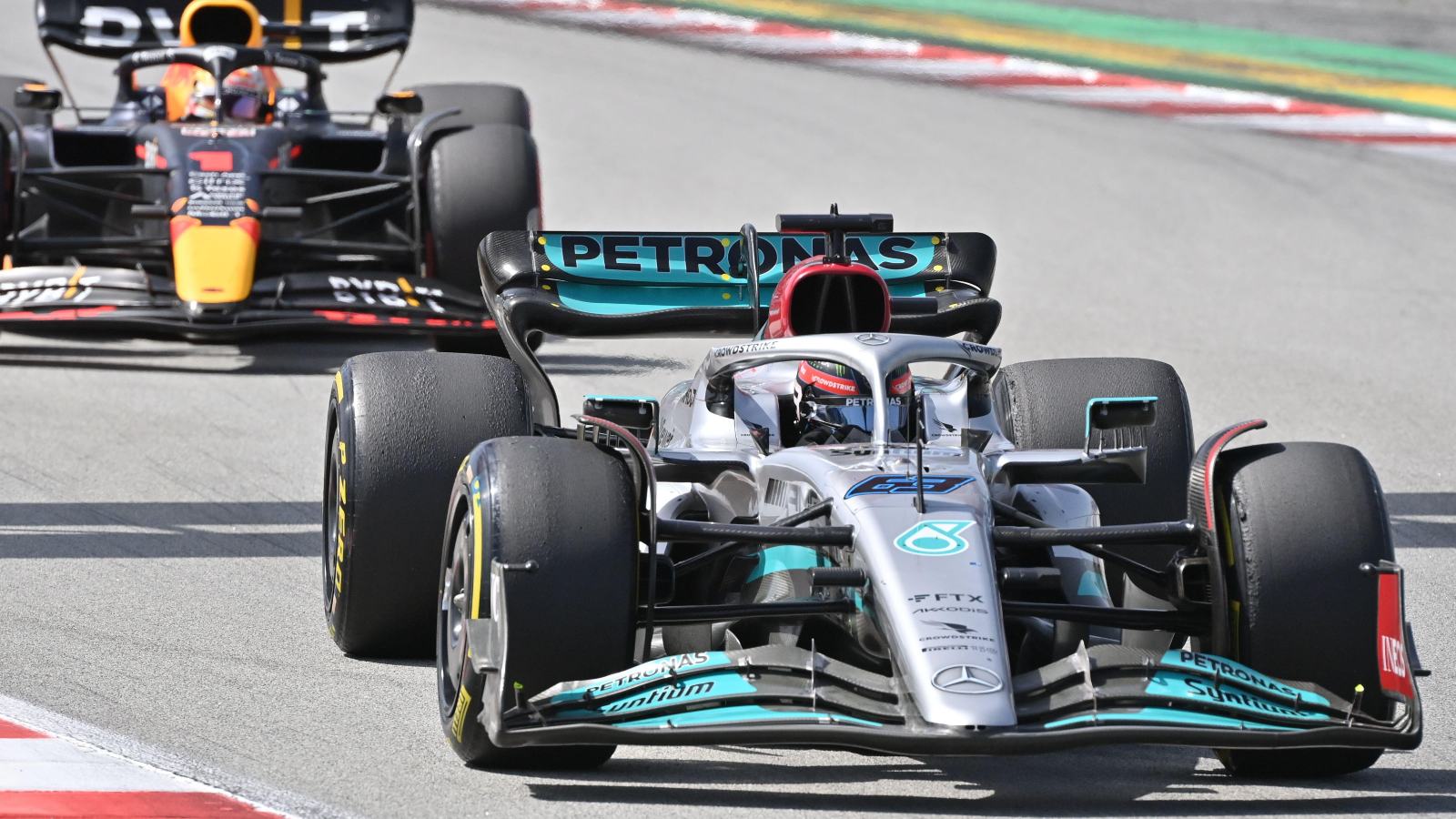 Mercedes driver George Russell defending against Max Verstappen. Barcelona, May 2022.