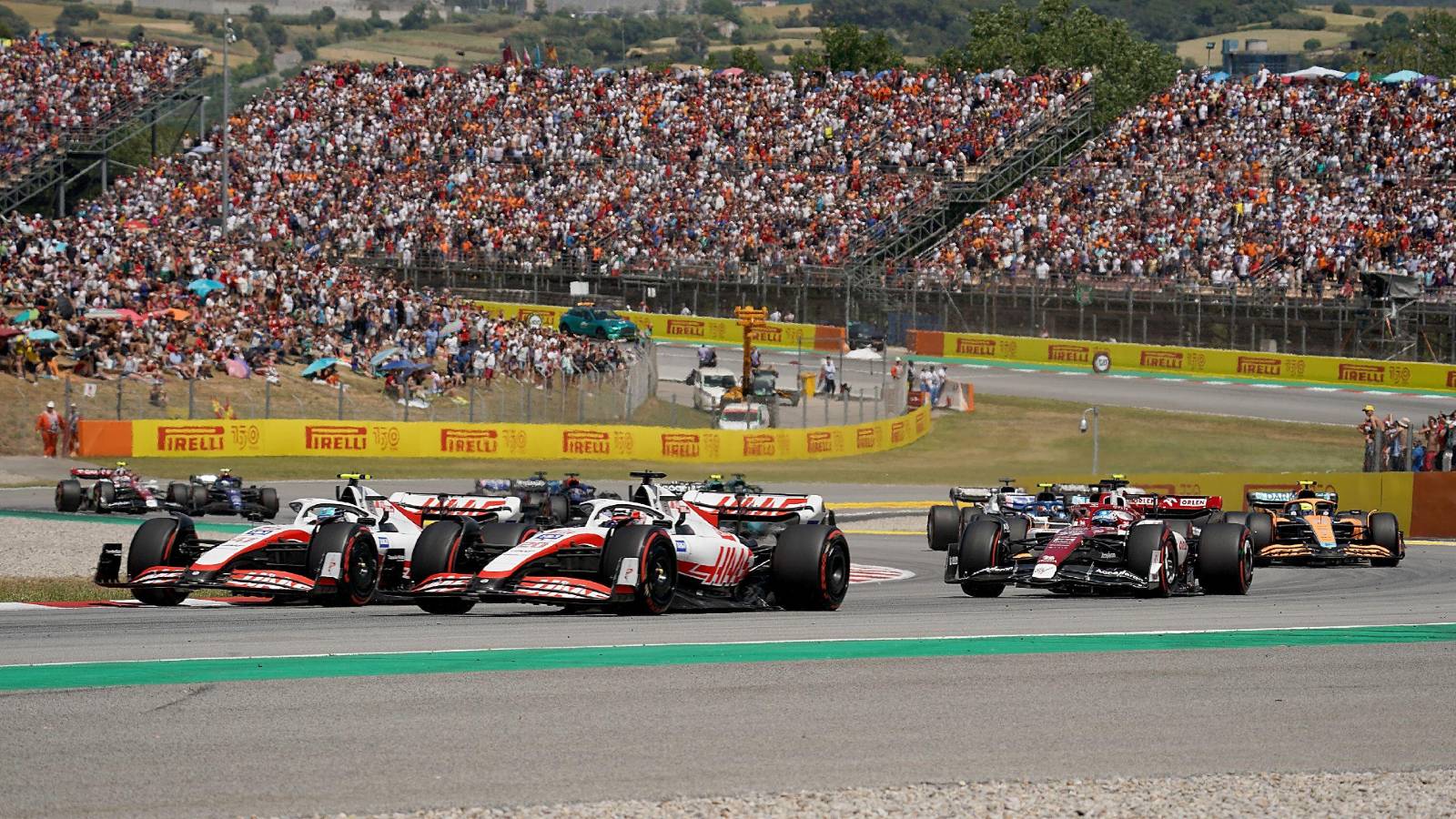 Haas cars at the front of a pack. Barcelona May 2022.