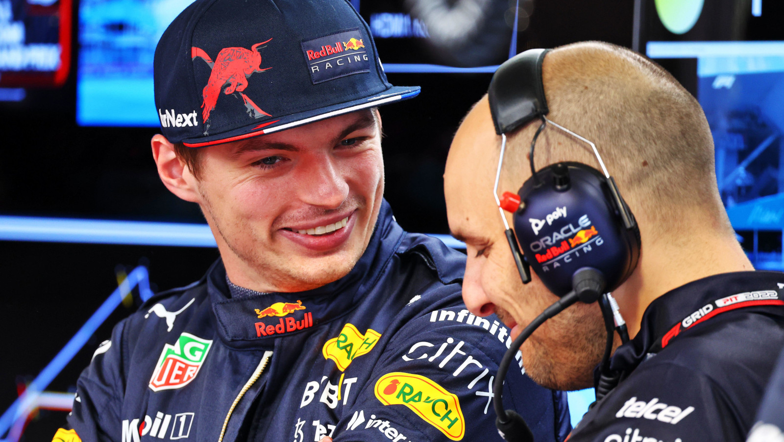 Max Verstappen smiling with his race engineer Gianpiero Lambiase. Miami May 2022