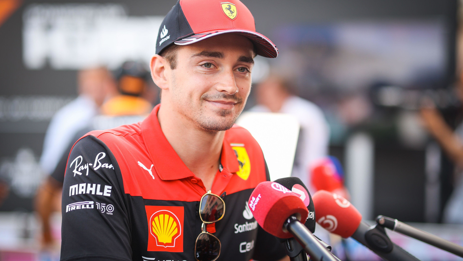 Charles Leclerc smiling for the media. Monaco May 2022