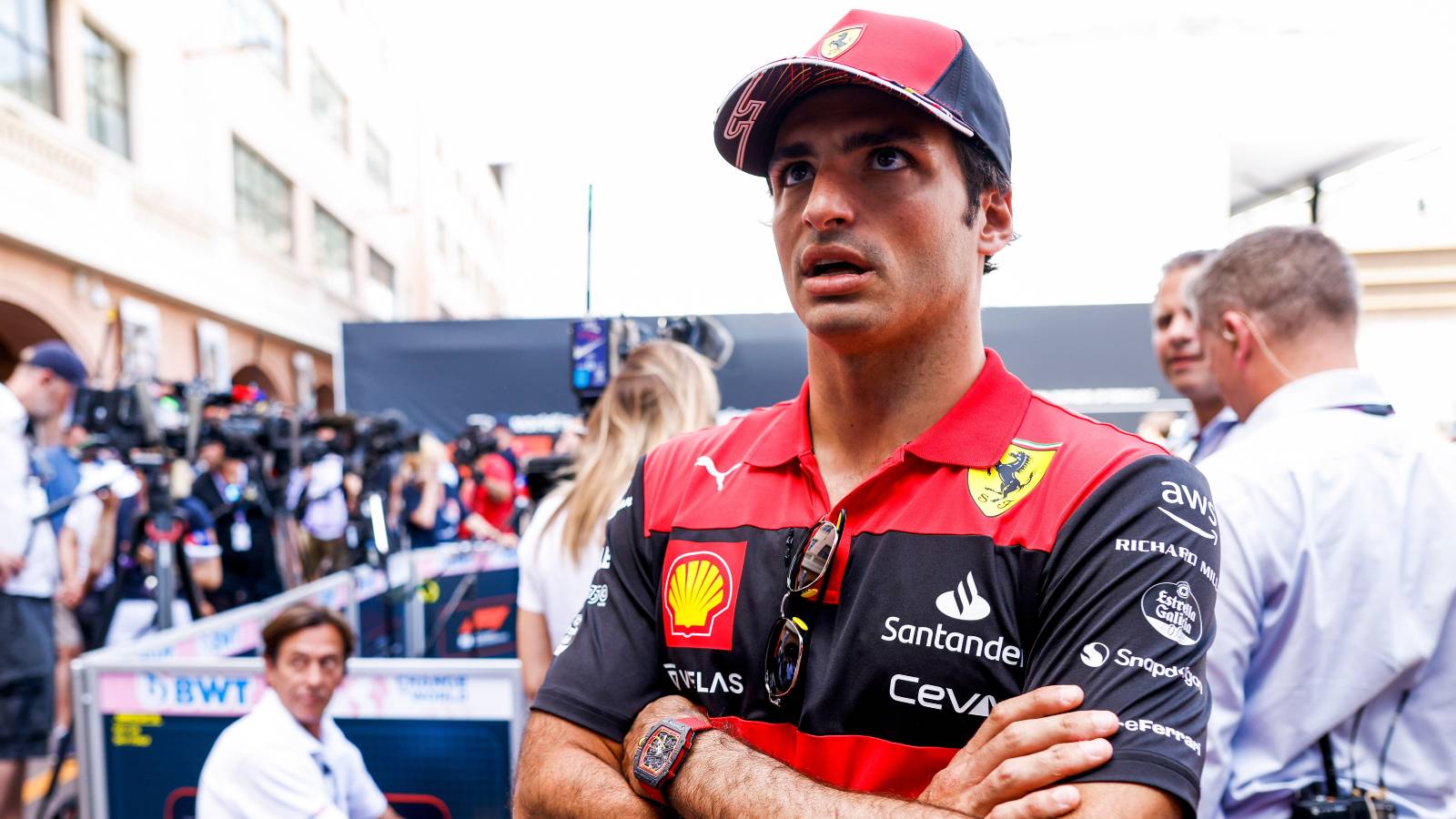 Carlos Sainz, Ferrari, looks up. Monaco, May 2022.