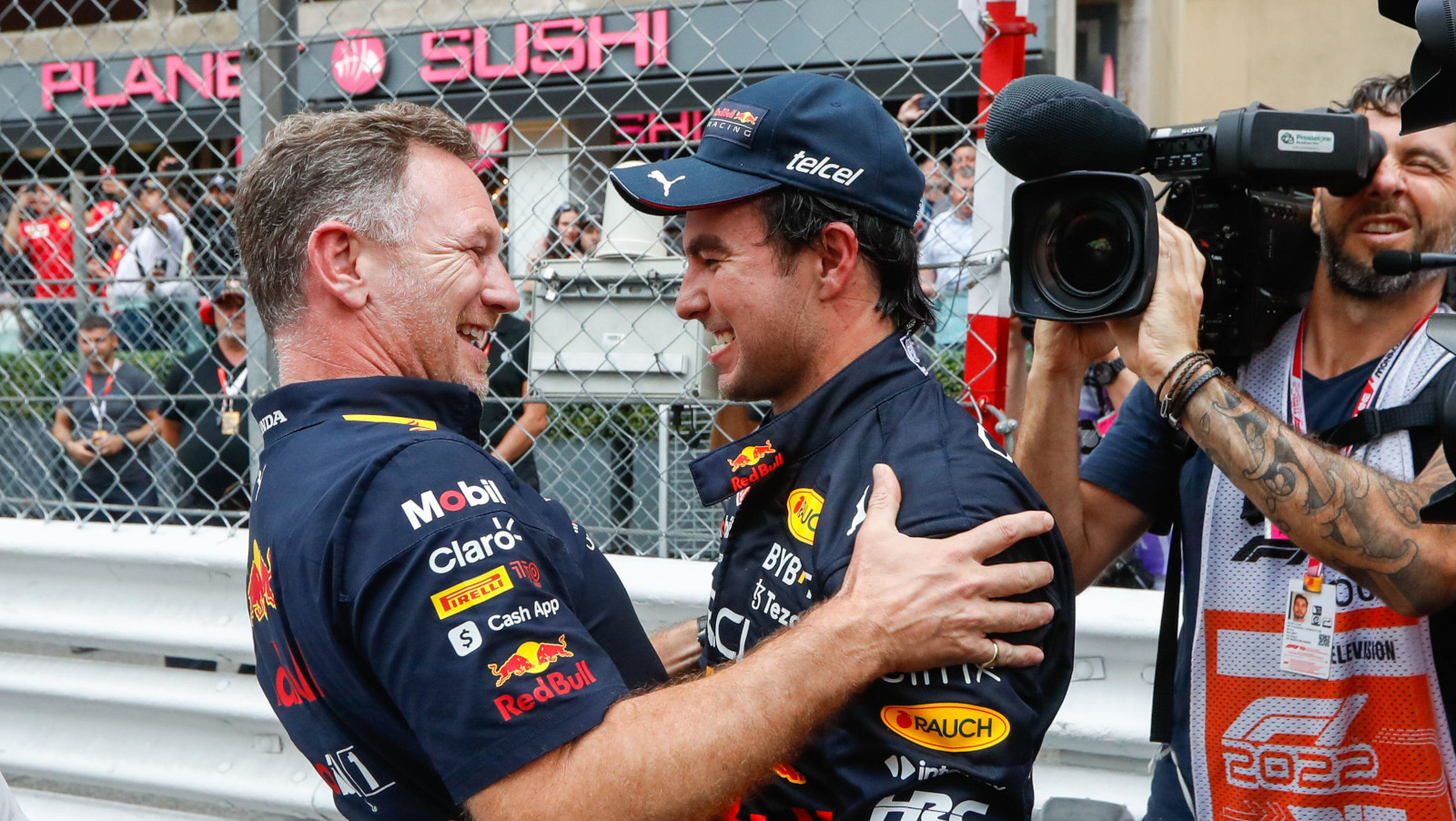 Christian Horner congratulates Sergio Perez on his way. Monaco May 2022