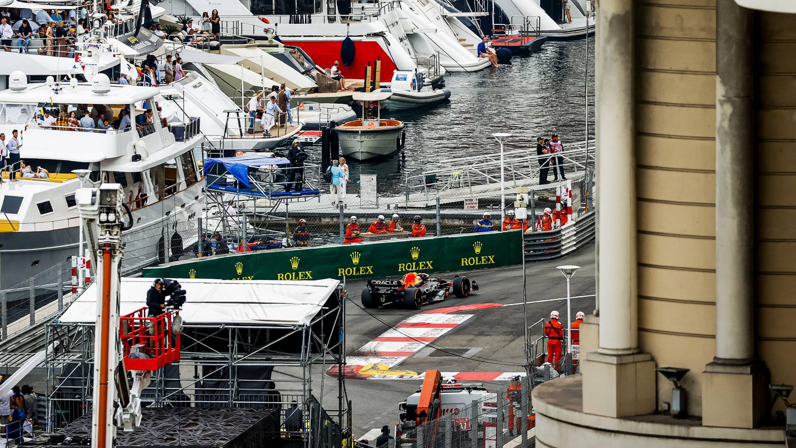 Max Verstappen passes boats in the Monaco harbour. Monte Carlo May 2022.