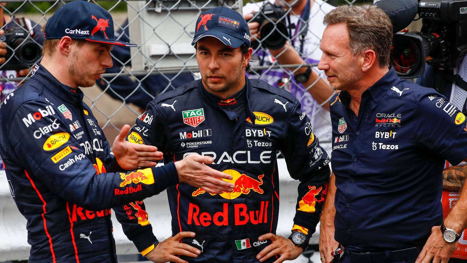 Max Verstappen, Sergio Perez and Christian Horner, Red Bull, talk. Monaco, May 2022