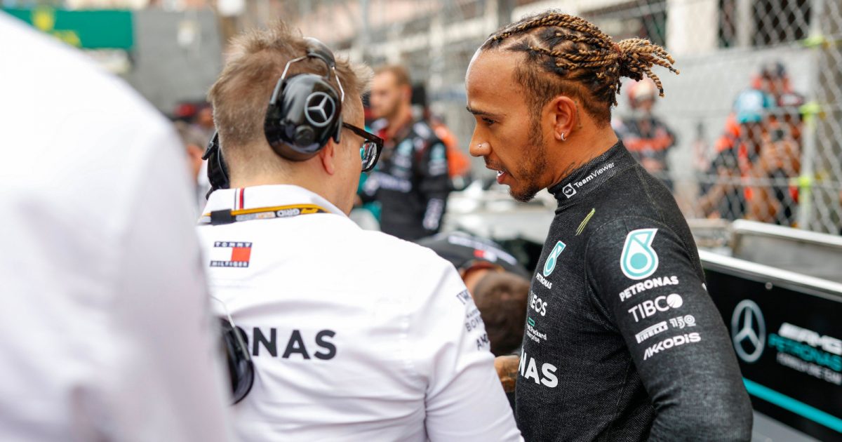 Lewis Hamilton speaks with a Mercedes engineer on the grid. Monaco May 2022