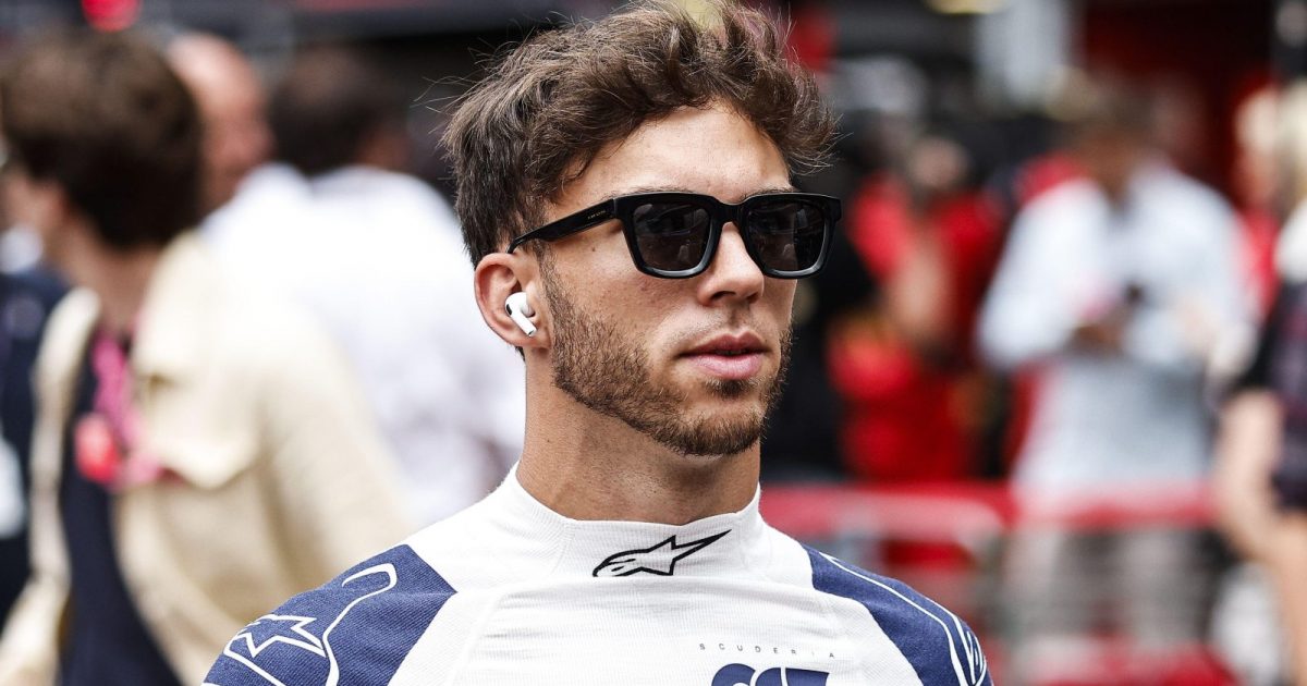 Pierre Gasly wearing sunglasses and headphones. Monaco, May 2022.