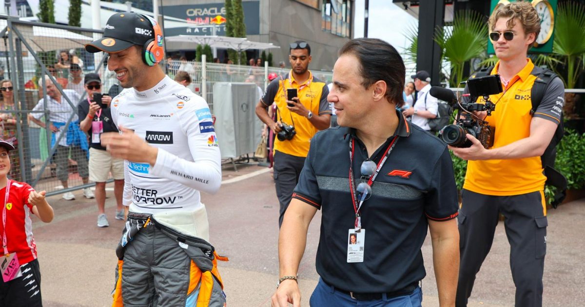 Felipe Massa walking next to Daniel Ricciardo. Monaco, May 2022.