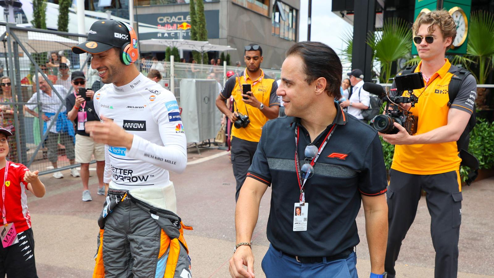 Felipe Massa walking next to Daniel Ricciardo. Monaco, May 2022.