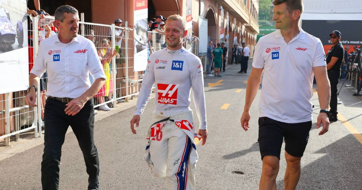 Kevin Magnussen walking alongside Guenther Steiner. Monaco May 2022.