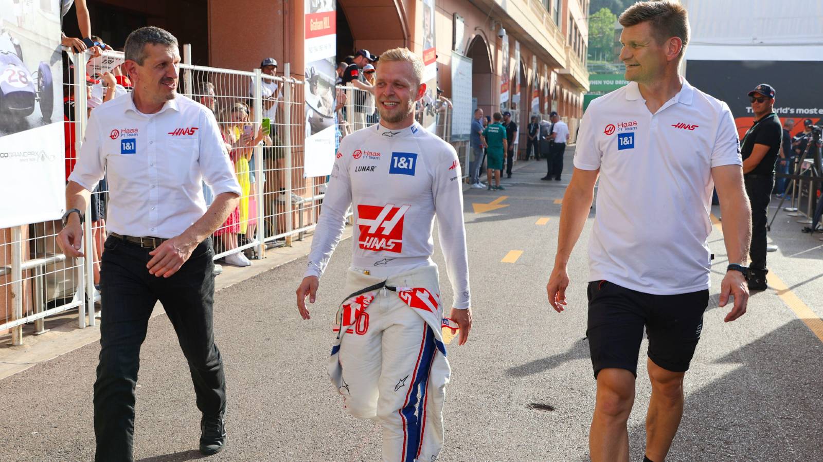 Kevin Magnussen walking alongside Guenther Steiner. Monaco May 2022.