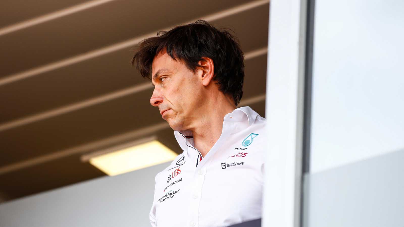 Toto Wolff stands on a balcony. Monaco May 2022.