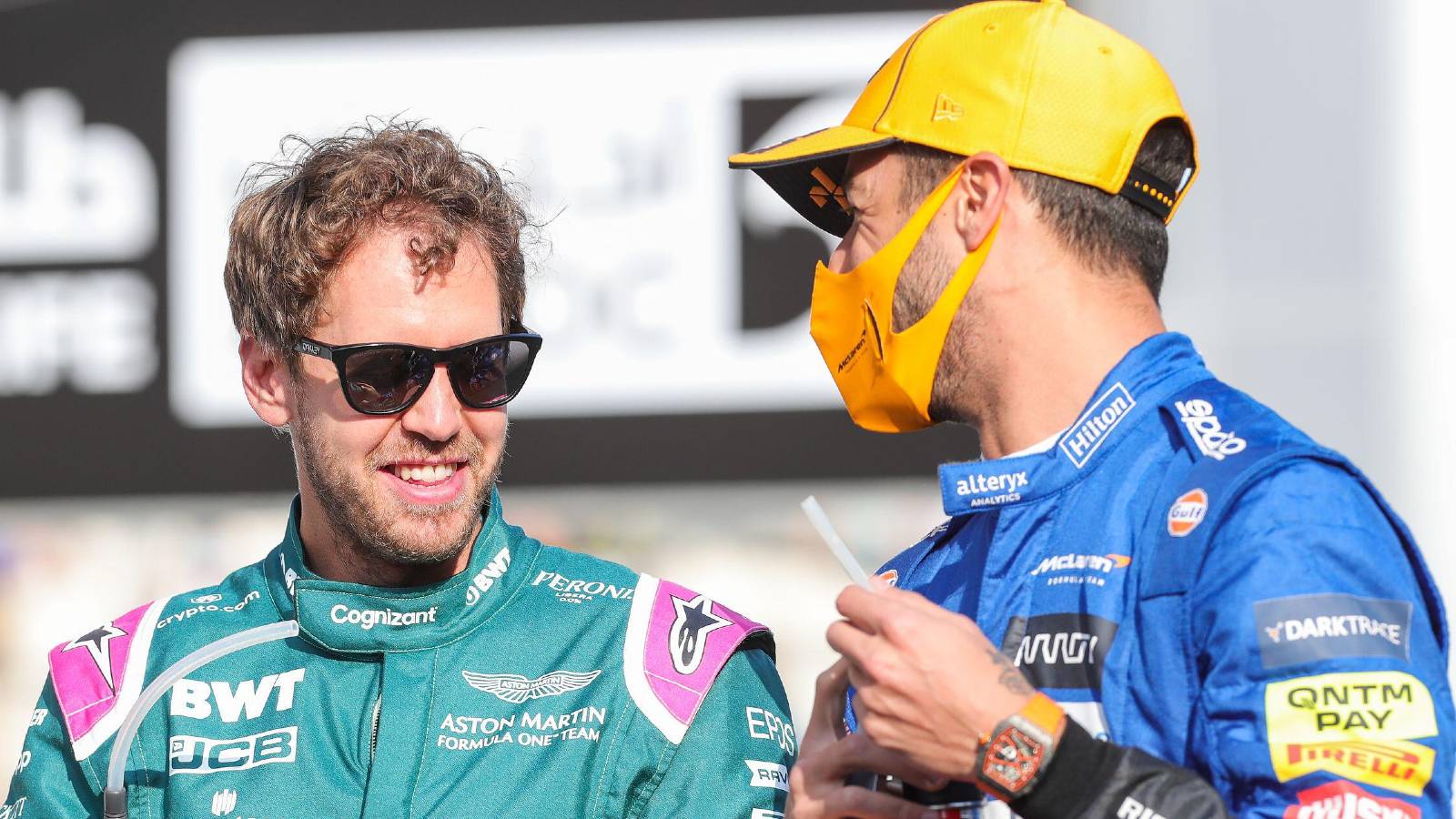 Sebastian Vettel and Daniel Ricciardo talk on the grid. Abu Dhabi, December 2021.