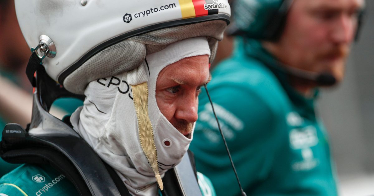 Sebastian Vettel with his helmet perched on his head. Monaco May 2022