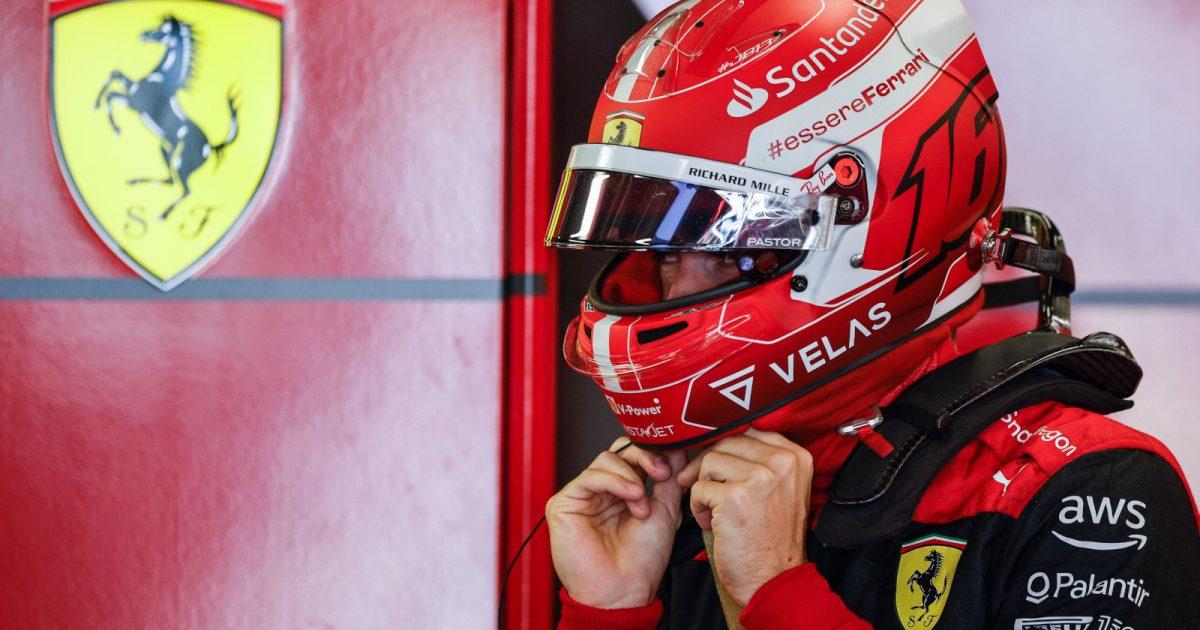 Charles Leclerc undoing the straps of his helmet. Baku June 2022