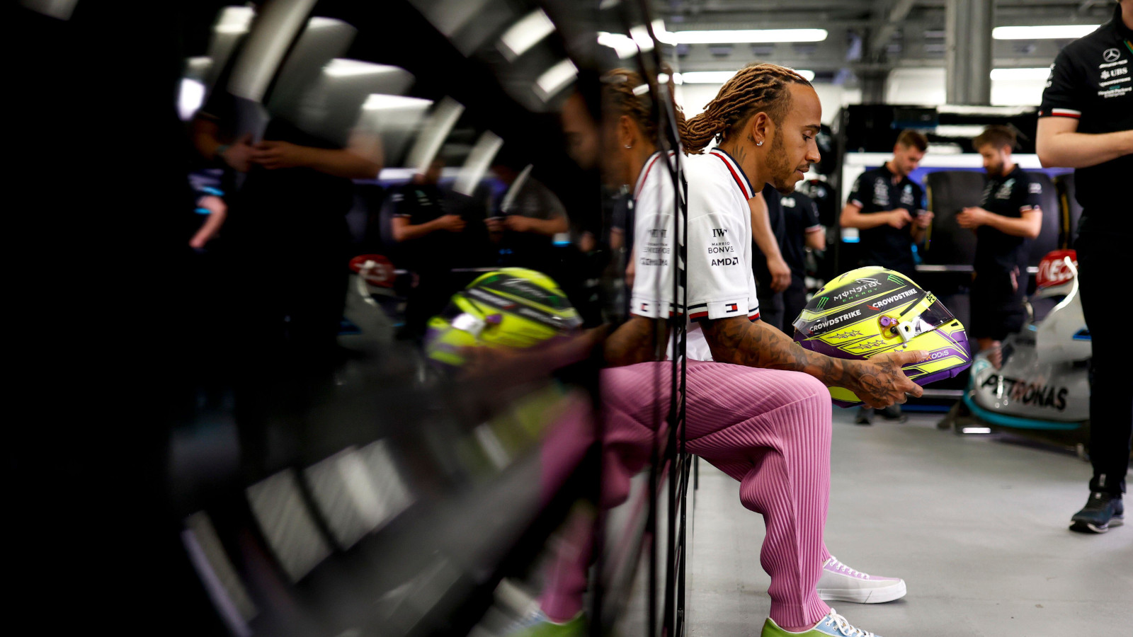 Lewis Hamilton staring at his helmet in the garage. Baku June 2022