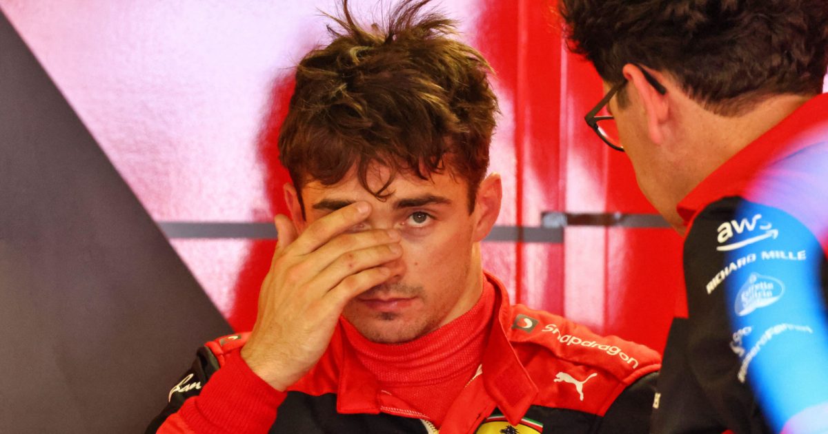 Mattia Binotto speaking with Charles Leclerc at the back of the garage. Monaco May 2022