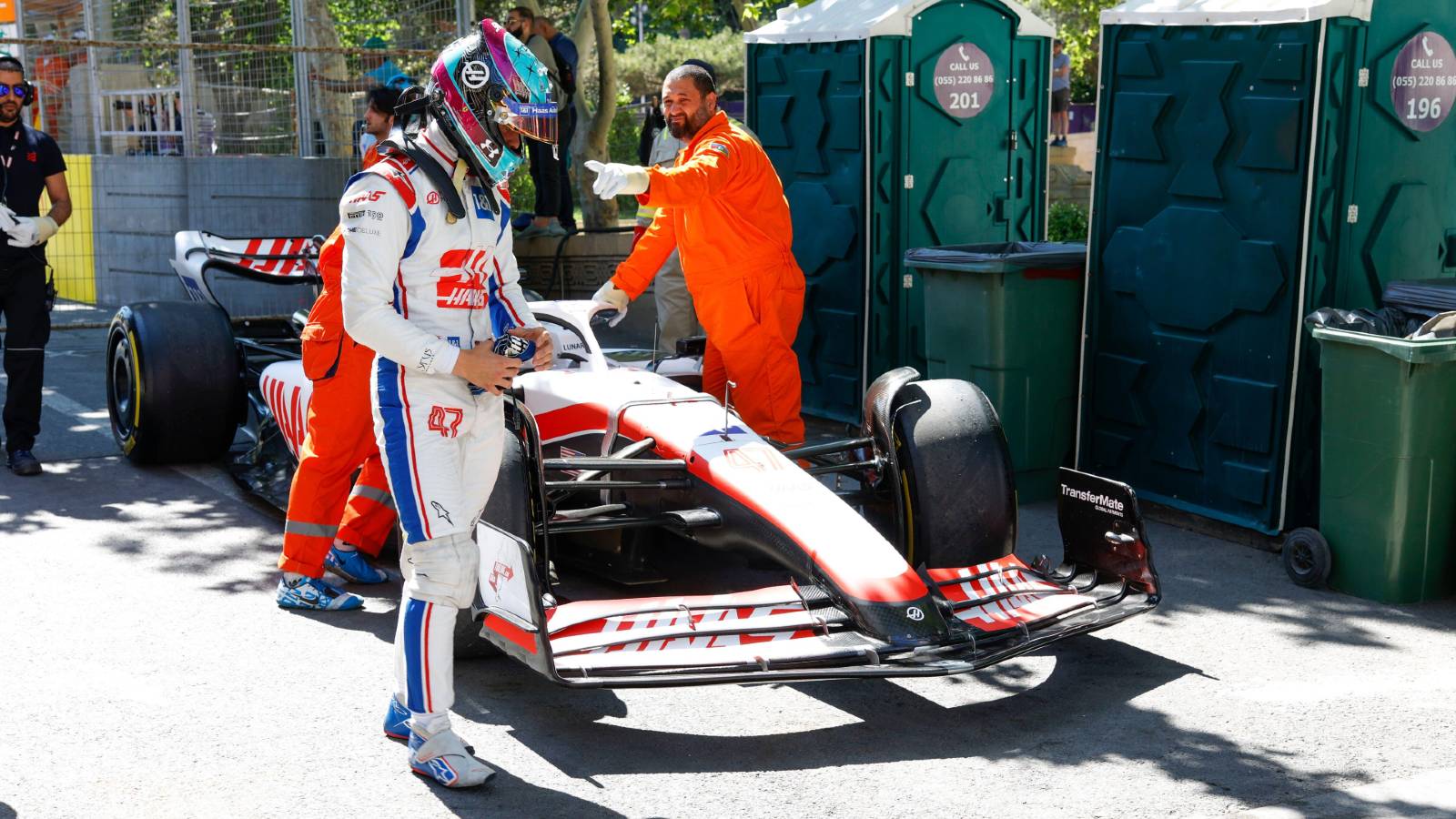 Mick Schumacher walks away from his broken down Haas. Baku June 2022.