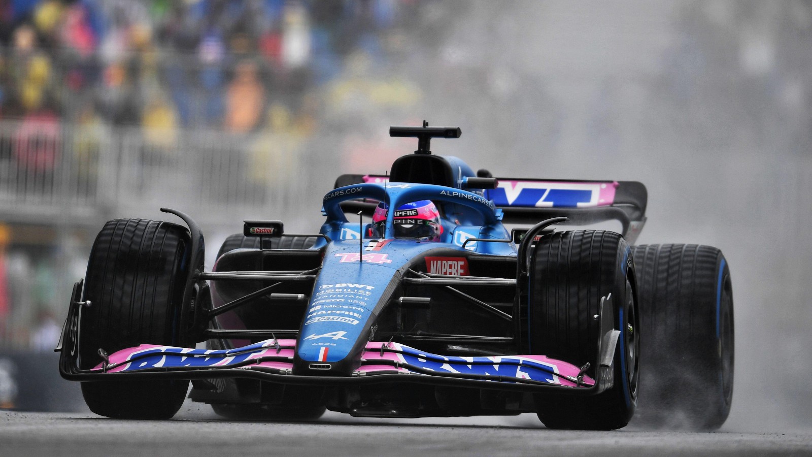 Fernando Alonso drives the Alpine in the wet. Canada, June 2022.