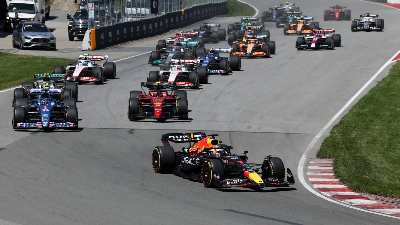 Max Verstappen leads on the opening lap of the Canadian Grand Prix. Montreal June 2022.
