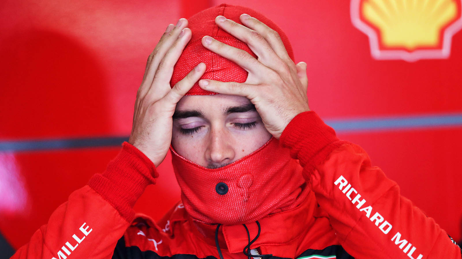 Charles Leclerc adjusts his balaclava in the garage. Montreal June 2022