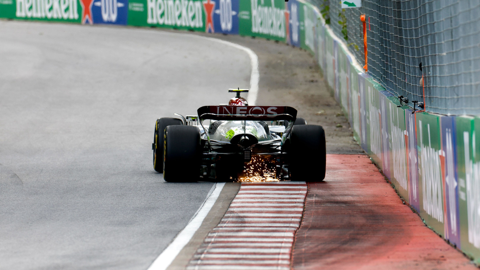 Lewis Hamilton from behind sparks on the kerb. Canada June 2022