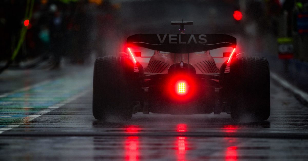 Charles Leclerc drives down a wet Circuit Gilles Villeneuve pit lane. Canada June 2022